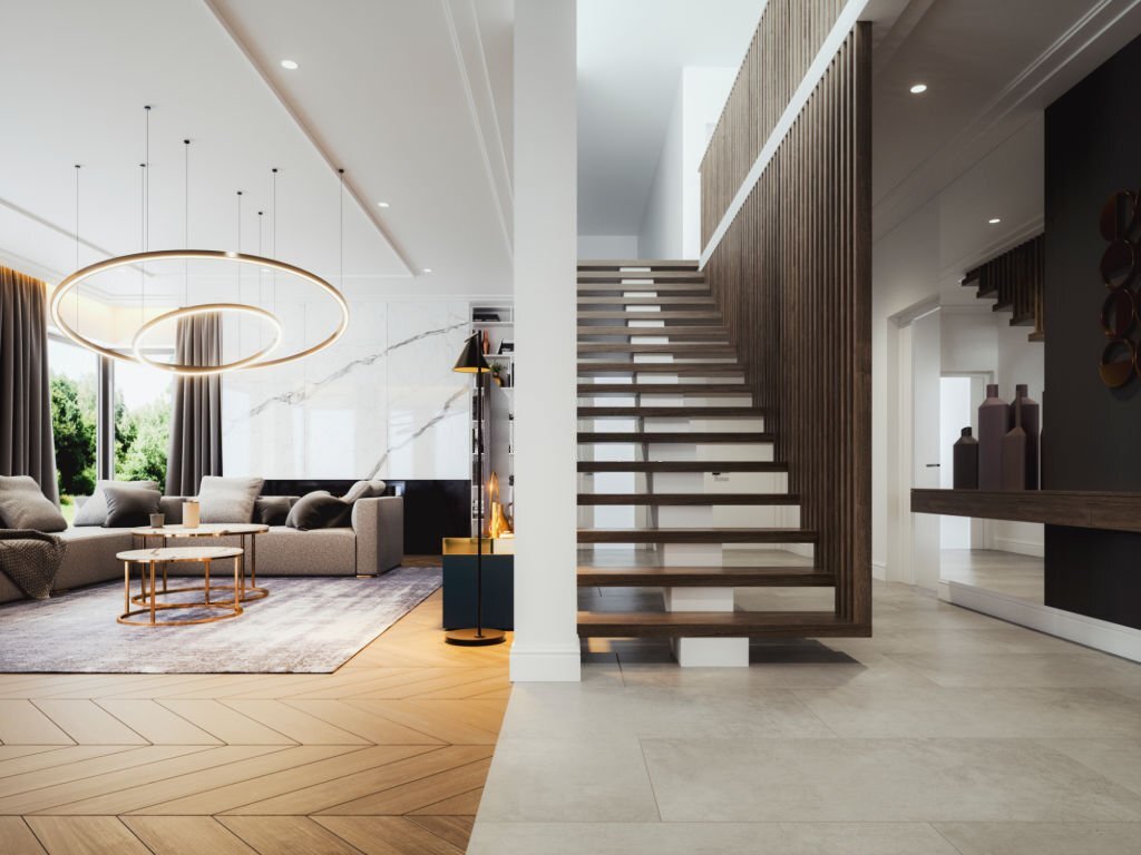 modern luxury design of living room with stairs besdie it from Sahyadri Developers